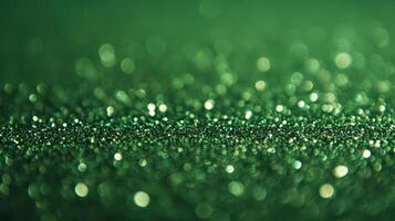 Green glitter background with bokeh effect photo