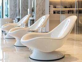 A row of chairs in a salon with a glass wall photo