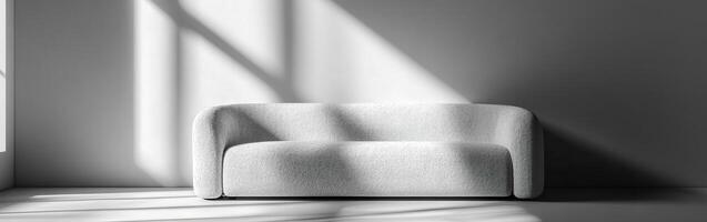 Modern boucle sofa in a sunlit minimalist interior space photo