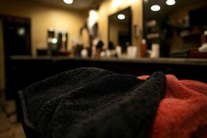 Microfiber towel resting on a counter in a stylish salon photo
