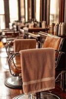 Microfiber towel draped on salon chair in a stylish hair salon photo