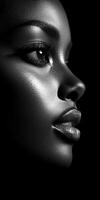 Captivating profile of a woman in black and white lighting photo