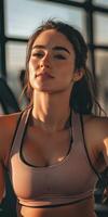 Fitness coach focuses on her workout routine photo