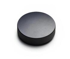 Hockey puck isolated on white background photo