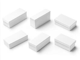 Varied arrangement of empty white boxes on a clean surface photo