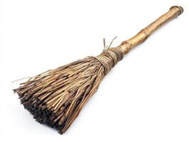 Traditional broom made of natural materials for cleaning tasks photo
