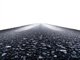Lonely asphalt road stretching into a foggy landscape photo