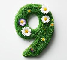 Creative green number nine with flowers arranged artistically photo