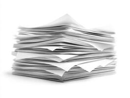 Stack of white papers piled on a clean surface in an office setting photo