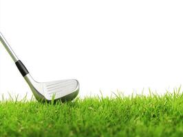Golf club poised for a swing on lush green grass photo