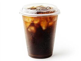 Refreshing iced beverage in clear cup with condensation details photo