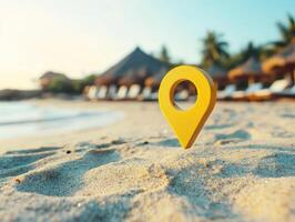 Beach location marker stands in sand with sunlit background photo
