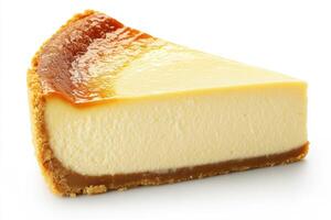 Creamy cheesecake slice with a caramel layer on crumb crust photo