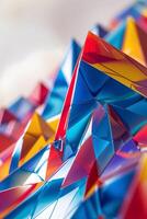 Colorful geometric peaks formed from reflective surfaces create a vibrant and dynamic visual experience in an artistic installation photo