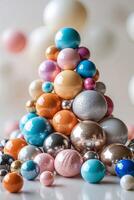 Colorful orbs arranged in various sizes creating a textured visual display in soft lighting photo