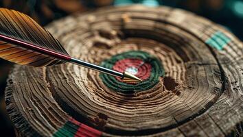 Archery target with arrow precisely hitting the bullseye at a quiet outdoor range during afternoon photo