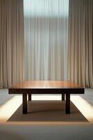 Minimalist wooden table illuminated by soft light in a serene indoor space with sheer curtains photo