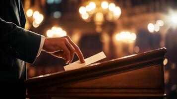 Individual casting a vote in an ornate indoor setting during a formal election event at night photo