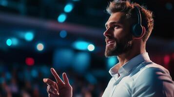 Engaging speaker addressing audience at a conference in a modern venue during evening hours photo
