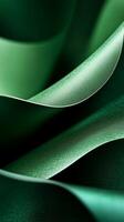 Textured green layers of material create a visually captivating composition showcasing elegance and depth photo