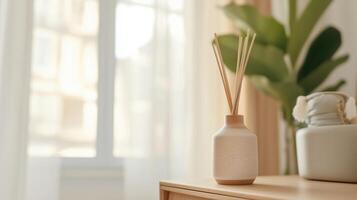 Decorative essential oil diffuser resting on a wooden table by a window, surrounded by indoor plants and natural light photo