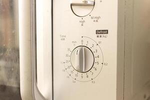a close up view of the timer on the oven photo