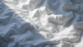 White fabric with soft folds and a strong beam of light creating shadows photo