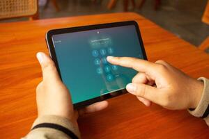 March 08, 2025, Semarang, Indonesia, security code on Apple iPad products photo