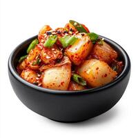 bowl of spicy Korean kimchi with red chili paste, garnished with green onions and sesame seeds, showcasing vibrant colors and textures photo