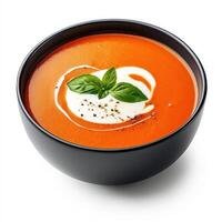 bowl of rich tomato soup with swirl of cream and fresh basil, evoking warmth and comfort. Perfect for cozy meal or delightful appetizer photo