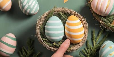 Hand painted pastel eggs in a rustic basket on an olive background with decorative elements photo