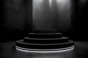Dark room with circular platform, illuminated base. photo