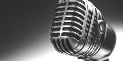 Vintage microphone rests against a clean white background emphasizing its classic design photo
