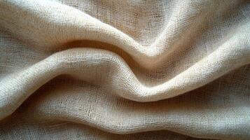 Folded beige linen fabric texture background photo