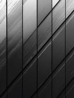 Angled dark panels with textured surfaces used for backgrounds or patterns photo