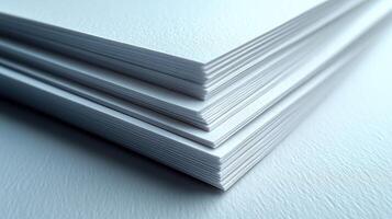 Stack of white paper sheets, smooth surface, close up, for printing use photo