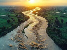 Winding river through rural landscape at sunset, aerial view photo