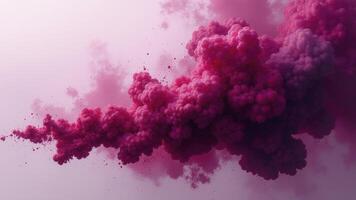 Pink ink forming a large cloud in water photo
