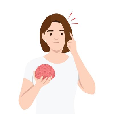 Woman holds a brain in one hand while pointing to her head, critical thinking, Power of the mind.