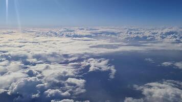 Flying above the sea of clouds on a sunny day. video