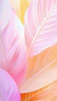 Close up of overlapping and and orange tropical leaves forming pink vibrant a textured natural pattern background photo
