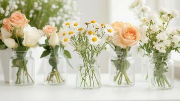 Bright floral bouquet arrangements of roses and tulips on display in a charming flower shop windows photo