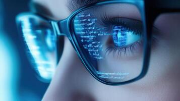 UX woman in glasses examining digital interfaces A data overlaying her face banner. with coding, big data analytics, artificial intelligence, technology, and innovation photo