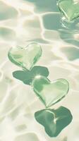 3d floating hearts delicately Glass on rippling water valentine love, bathed in soft golden light background, conveying intimate. Vertical format reflective water surface. photo