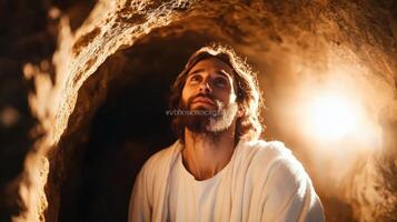 Happy Easter gazing Jesus rising from stone sepulcher, divine skyward with Resurrected tranquility photo