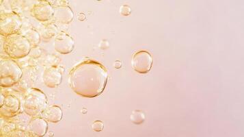 Bubbles rise in golden liquid against a soft pastel background, creating an enchanting visual experience that captivates the viewer's attention photo