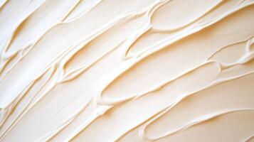 Creamy texture of smooth frosting spread evenly on a surface in a well-lit kitchen, capturing the art of baking during the afternoon photo