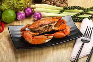 A plate of food with a crab on it photo