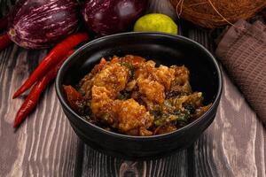 A bowl of food on a table photo