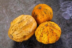 Three different types of squash on a table photo